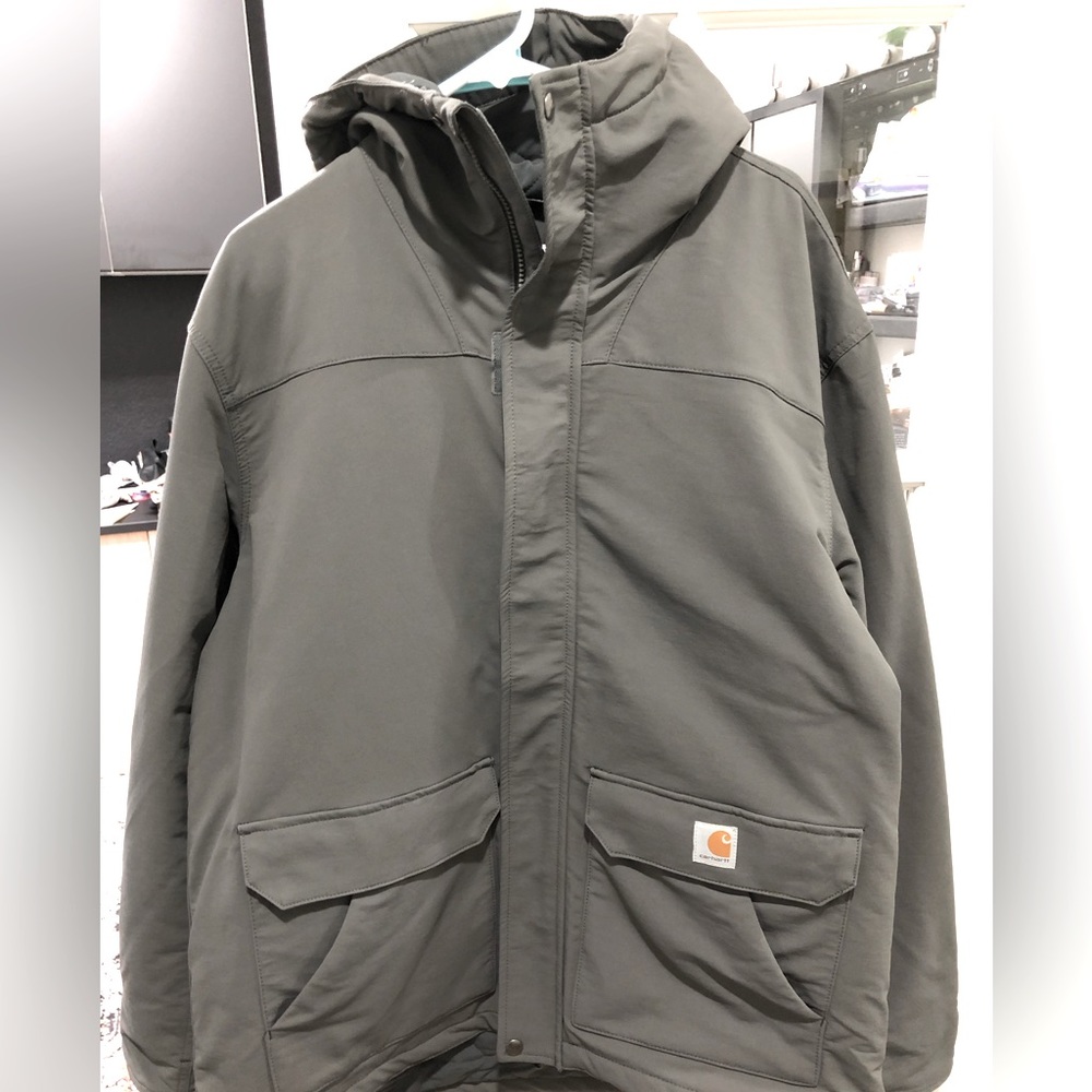 Carhartt rain defender super dux jacket. Size large. Fits like a XL.